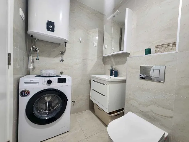 One-Bedroom Apartment 53 m² with Terrace and City & Sea View — Bečići — photo 10